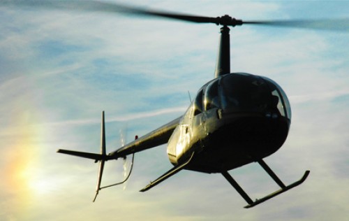 Golden Deals - Helikopterbeleving van 30 minuten boven Amsterdam, Gouda of Den Bosch