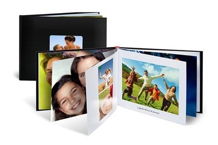 Groupon - Luxe fotoboek in A4-formaat met harde kaft, kies uit 26, 50, 100 pagina’s bij Photobox